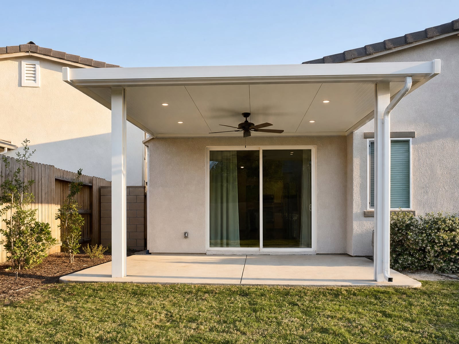 Insulated Aluminum Patio Cover: White insulated patio cover with recessed lights