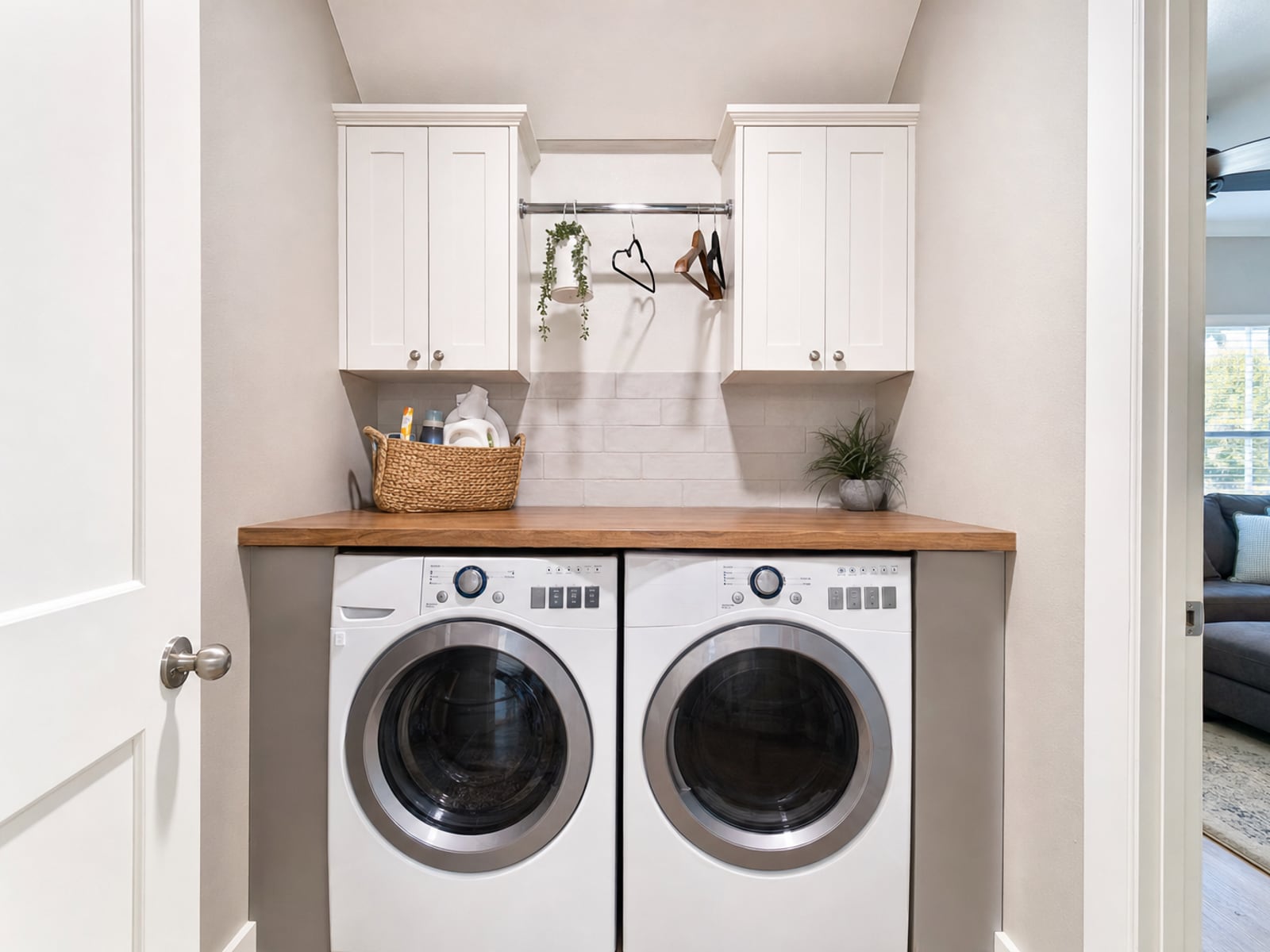 Laundry Room Cabinets & Counter: Laundry room with cabinets and folding counter