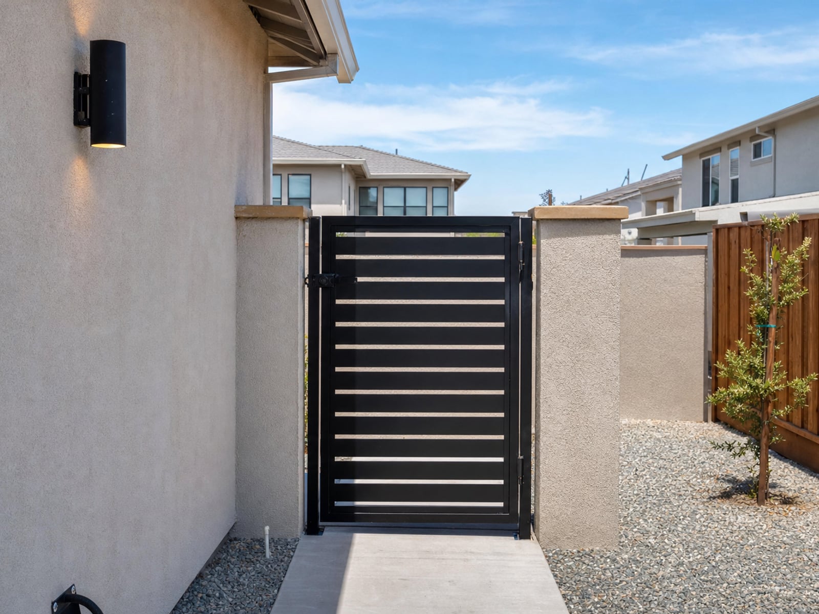 Steel Privacy Gate: Black steel privacy gate